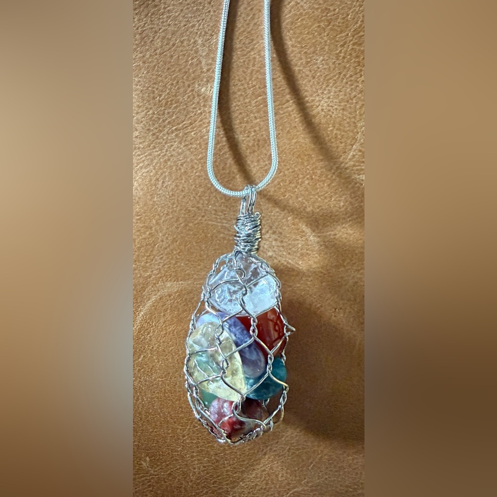 wire-wrapped 7 chakra gemstone pendant necklace.